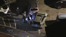 A police investigation in a parking lot in Plymouth, Massachusetts, on Friday, Oct. 25, 2024.