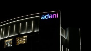 Signage atop the Adani Group headquarters in Ahmedabad, India, on Wednesday, Feb. 1, 2023. Bonds of the Indian billionaires flagship firm plunged to distressed levels in US trading, and the company abruptly pulled a record domestic stock offering.