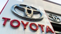 A sign is displayed outside a Toyota Motor Corp. dealership on Jan. 30, 2024 in Tokyo, Japan.