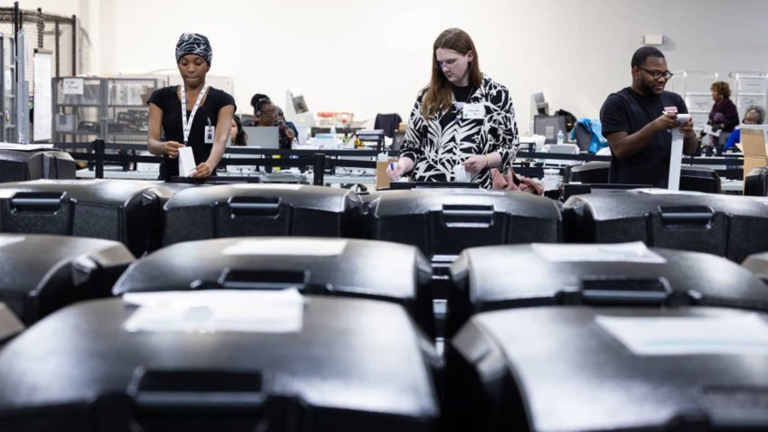 LAWRENCEVILLE, GEORGIA – NOVEMBER 5: Gwinnett County election workers organize and prepare early in-person voting machines for final vote tabulation at the Gwinnett Voter Registrations and Elections on November 5, 2024 in Lawrenceville, Georgia. Americans cast their ballots today in the presidential race between Republican nominee former President Donald Trump and Democratic nominee Vice President Kamala Harris, as well as multiple state elections that will determine the balance of power in Congress. (Photo by Jessica McGowan/Getty Images)