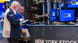 Traders work on the New York Stock Exchange floor on November 12, 2024 in New York City.