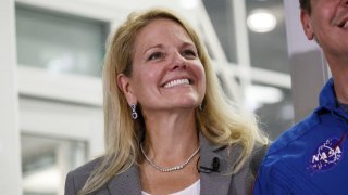 Gwynne Shotwell, president and chief operating officer of Space Exploration Technologies Corp. (SpaceX), smiles during the NASA Commercial Crew Program (CCP) astronaut visit at the SpaceX headquarters in Hawthorne, California, U.S., on Monday, Aug. 13, 2018. 