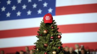 A “Keep America Great” hat tops off a Christmas tree at a “Merry Christmas” rally hosted by President Donald Trump at the Kellogg Arena in Battle Creek, Michigan, Dec. 18, 2019.