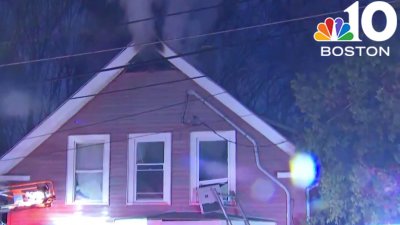 Crews battling fire at Stoneham home