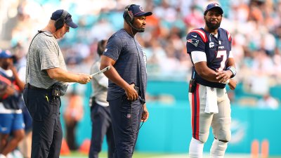 Patriots offensive coordinator Alex Van Pelt, head coach Jerod Mayo and quarterback Jacoby Brissett