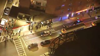 Police at the Broadway MBTA Red Line station in Boston on Friday, Nov. 8, 2024, after a report of a shooting.