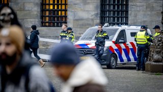 Netherlands' Police officers patrol on Dam Square in Amsterdam, on November 9, 2024. Extra security measures were taken in Amsterdam following violent clashes on November 7, 2024, between fans of Ajax, Maccabi Tel Aviv and Turkish club Fenerbahce, who were playing another Dutch club, AZ Alkmaar. The city has a introduced a temporary ban on demonstrations throughout the capital this weekend and has also been designated a security risk area.