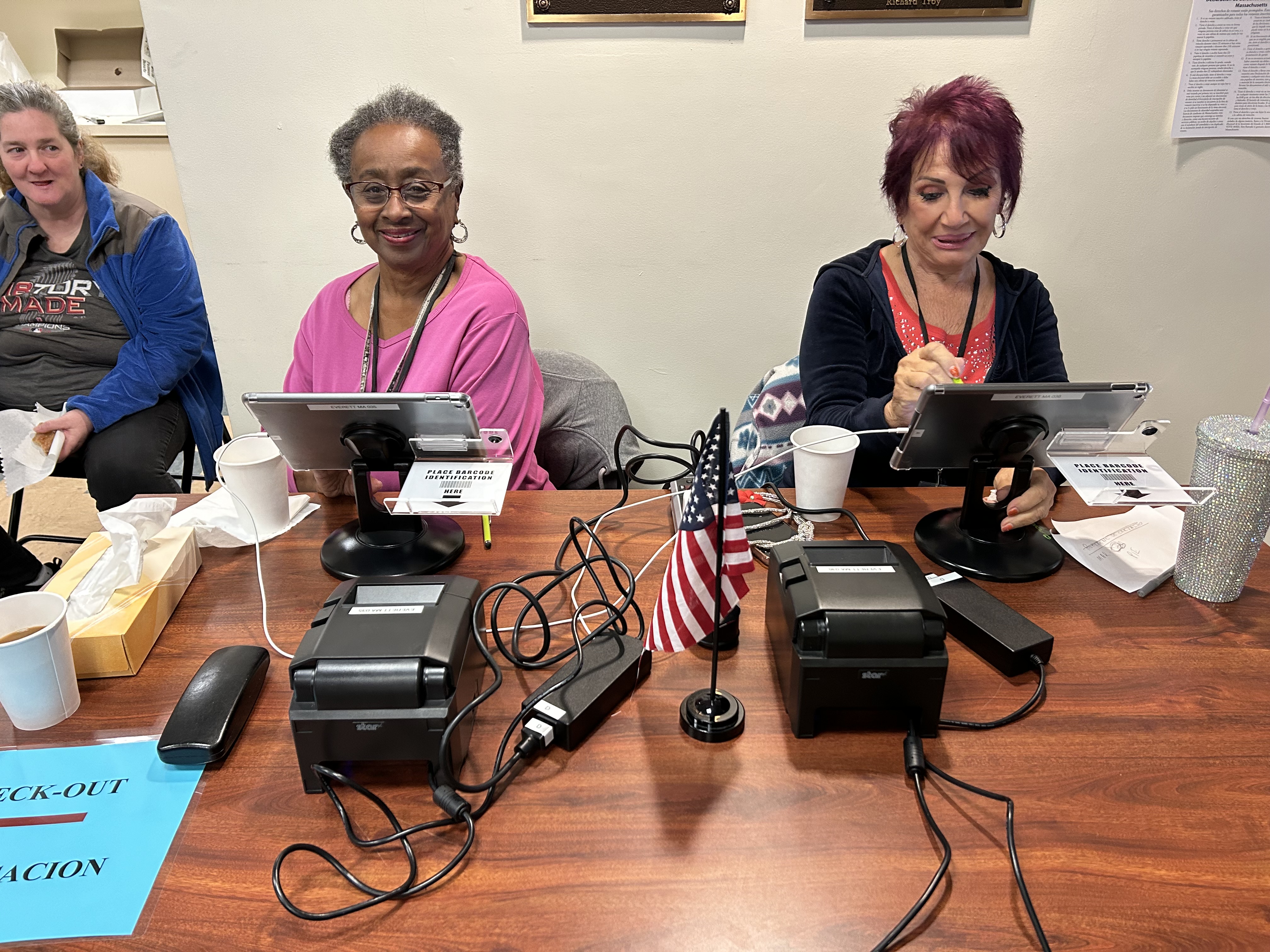 Workers at a polling place in Everett, Massachusetts, on Election Day