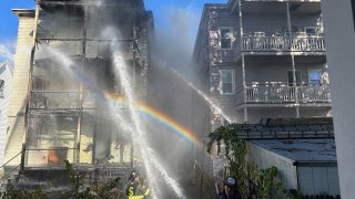 Firefighters working a scene in Somerville, Massachusetts, on Nov. 8, 2024.