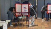 People voting early in Boston on Friday, Nov. 1, 2024.