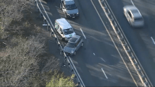 A crashed car and van on Route 128 in Gloucester, Massachusetts, on Friday, Nov. 15, 2024.