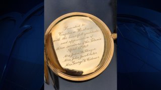 a gold pocket watch that was given to Capt. Arthur Rostron