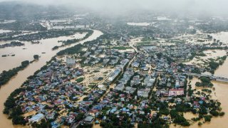 This aerial picture shows flooded streets and buildings in Thai Nguyen on September 10, 2024, a few days after Super Typhoon Yagi hit northern Vietnam.