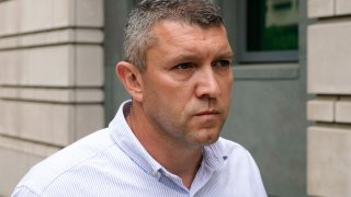 File photo: Then-Washington Metropolitan Police Department Lt. Shane Lamond departs federal court after pleading not guilty to obstruction of justice and other charges on May 19, 2023, in Washington, D.C.