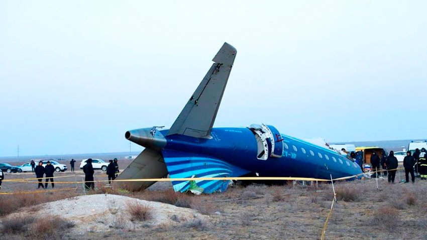 a part of Azerbaijan Airlines' Embraer 190 lies on the ground