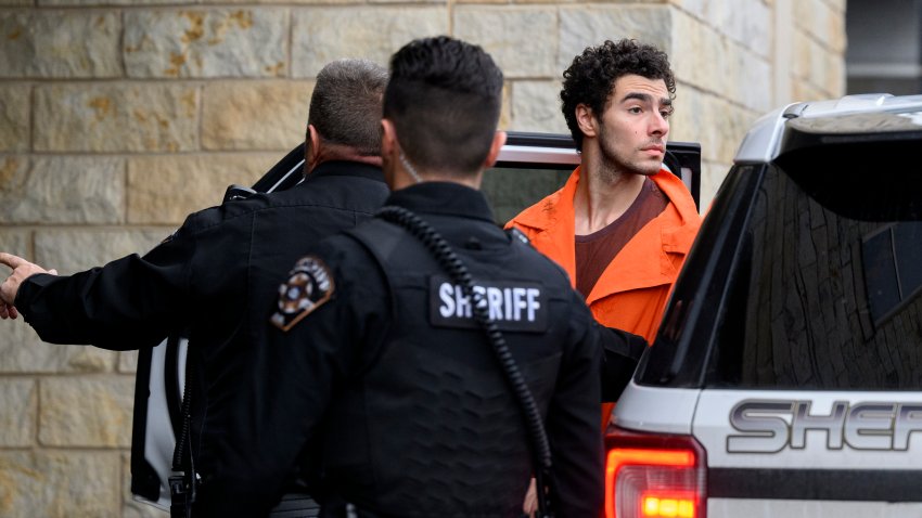 HOLLIDAYSBURG, PENNSYLVANIA – DECEMBER 10: Suspected shooter Luigi Mangione is led into the Blair County Courthouse for an extradition hearing December 10, 2024 in Hollidaysburg, Pennsylvania. Mangione has been arraigned on weapons and false identification charges related to the fatal shooting of United Healthcare CEO Brian Thompson in New York City. Mangione is incarcerated in the State Correctional Institution in Huntingdon, Pennsylvania awaiting extradition to New York.