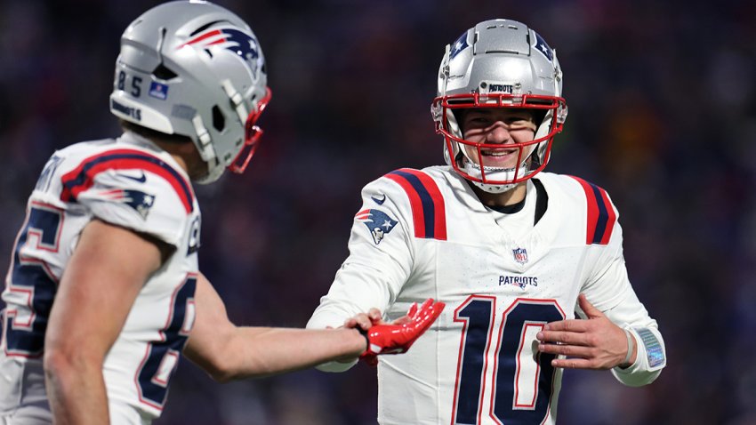 Patriots tight end Hunter Henry and quarterback Drake Maye