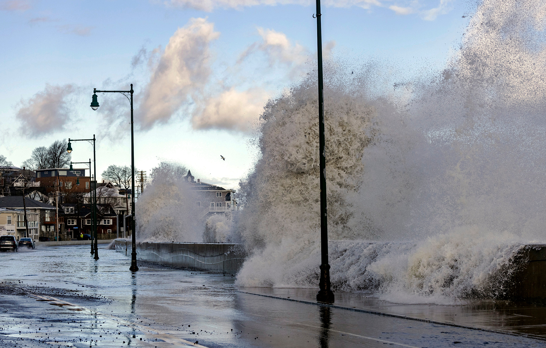 Jan. 10, 2024: Waves crash over the seawall along Winthrop Shore Drive in Revere.