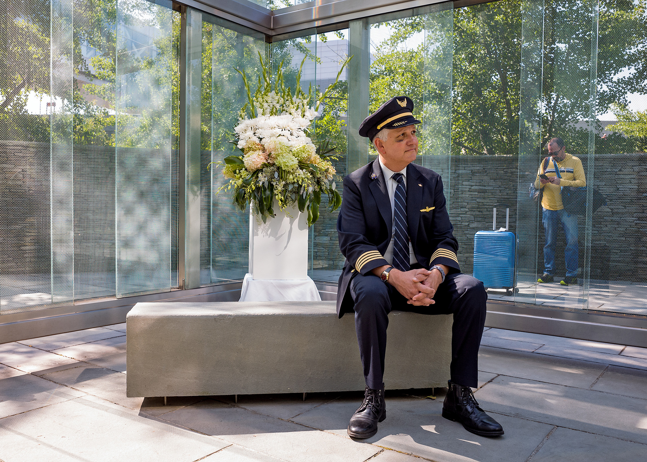 Sept. 11, 2024: Capt. Grant Proops, a United Airlines pilot, sits during a quiet moment at the 9/11 Memorial at Boston’s Logan airport on the 23rd anniversary of the attacks on America.