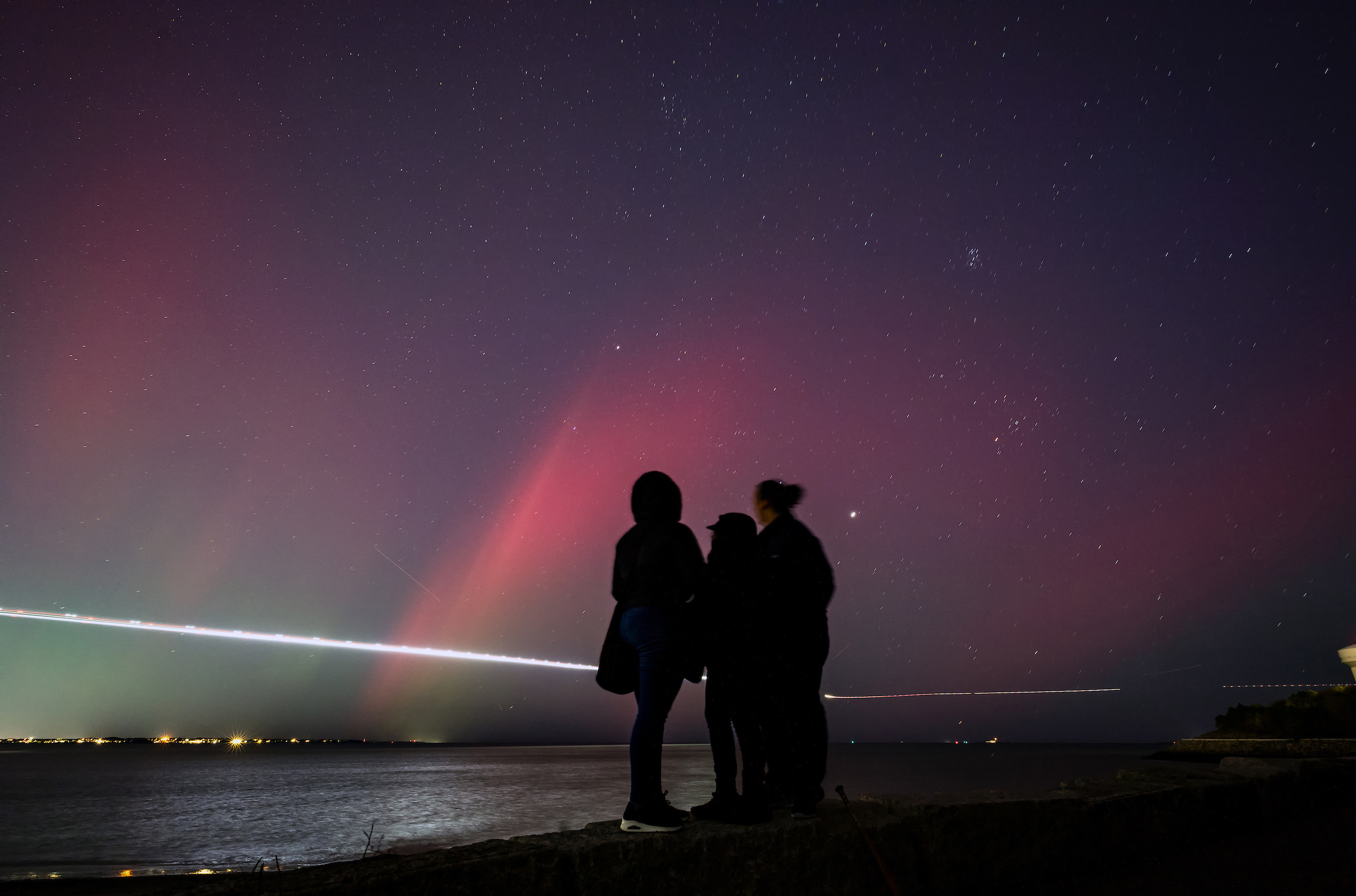 Oct. 10, 2024: The northern lights are seen on and near Boston’s Deer Island, thrilling people on the ground and on arriving airliners to Boston’s Logan airport alike.