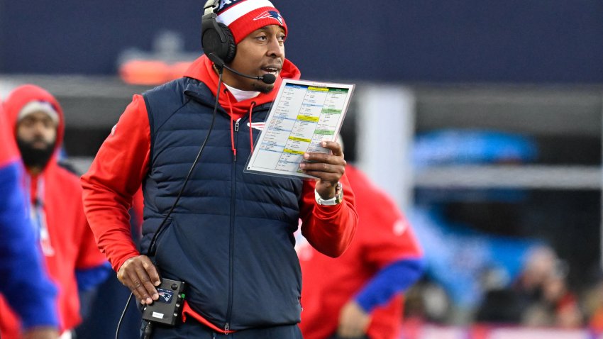 Dec 1, 2024; Foxborough, Massachusetts, USA; New England Patriots defensive coordinator Demarcus Covington works from the sideline during the second half against the Indianapolis Colts at Gillette Stadium. Mandatory Credit: Eric Canha-Imagn Images