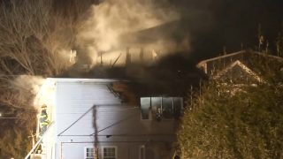 A burning home in Acushnet, Massachusetts, on the morning of Christmas, Dec. 25, 2024.