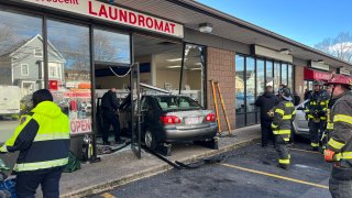 A car that crashed into a laundromat in Brockton, Massachusetts, on Thursday, Dec. 19, 2024.