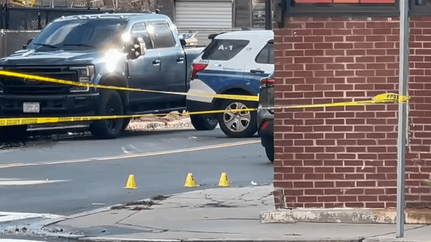 The scene of a car crash behind caution tape in Boston's Charlestown neighborhood on Thursday, Dec. 12, 2024.