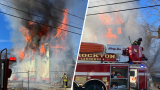 Flames erupting from a building on Otis Street in Brockton, Massachusetts, on Dec. 3, 2024.