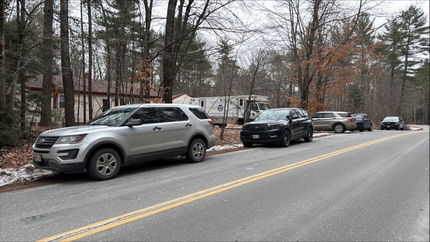 Police outside a home in Sidney, Maine, where a homicide investigation was taking place on Friday, Dec. 20, 2024.