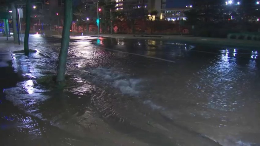 A large water main break in Newton, Massachusetts, has some roads shut down in busy Newton Corner on Dec. 18, 2024.