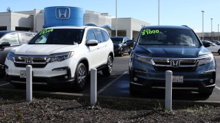 Used Honda Pilots are displayed on the sales lot at Honda Marin on February 06, 2024 in San Rafael, California.