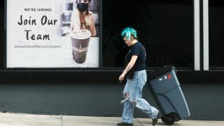  A ‘Join Our Team’ sign is posted outside a coffee shop on January 03, 2024 in Los Angeles, California. 