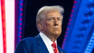 U.S. President-elect Donald Trump looks on during Turning Point USA’s AmericaFest at the Phoenix Convention Center on December 22, 2024 in Phoenix, Arizona. 