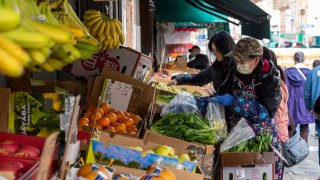 Shoppers at a produce store in the Chinatown district of San Francisco, California, U.S., on Monday, Jan. 6, 2025. 