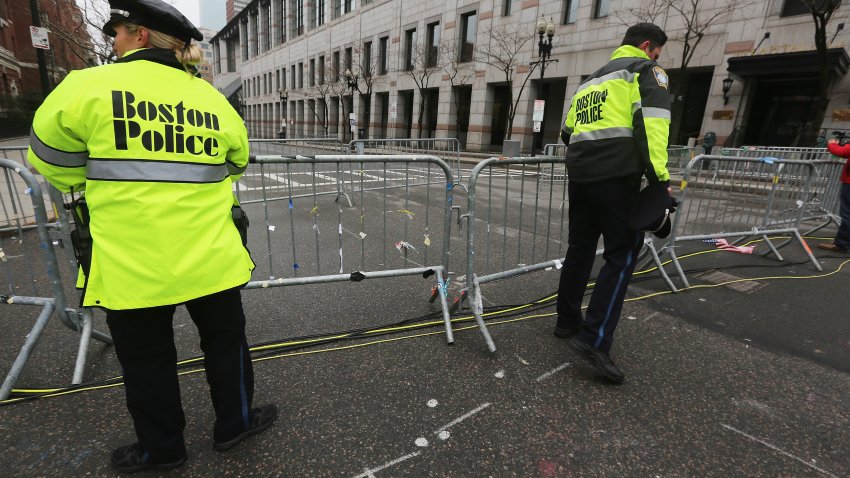 BOSTON, MA – APRIL 23:  Police close a barricade along a still closed section of Boylston Street near the site of the Boston Marathon bombings on April 23, 2013 in Boston, Massachusetts . Business owners and residents of the closed section were allowed to return to their properties today while under escort of city staff.