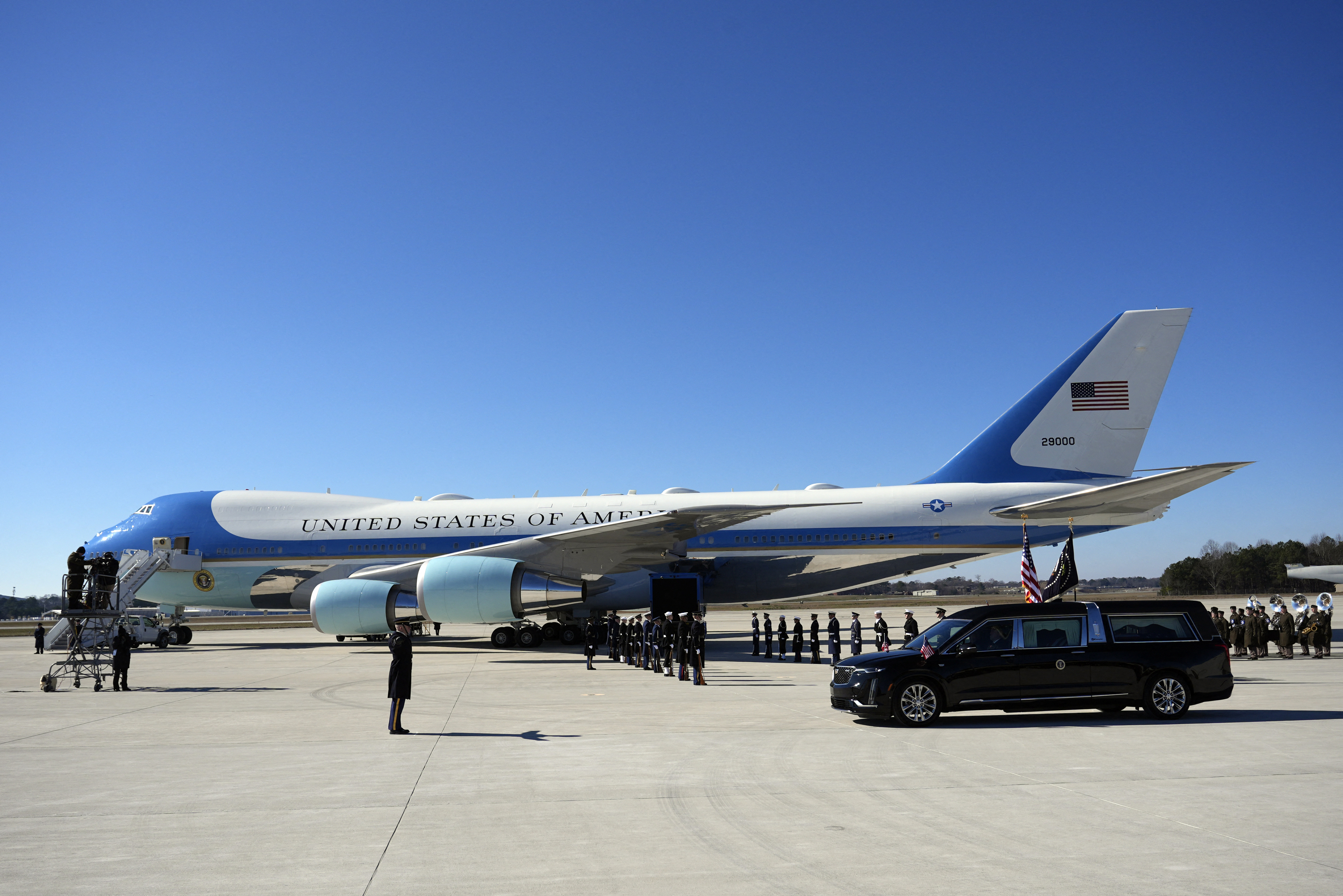 The hearse carrying the casket arrives at Dobbins Air Reserve Base.