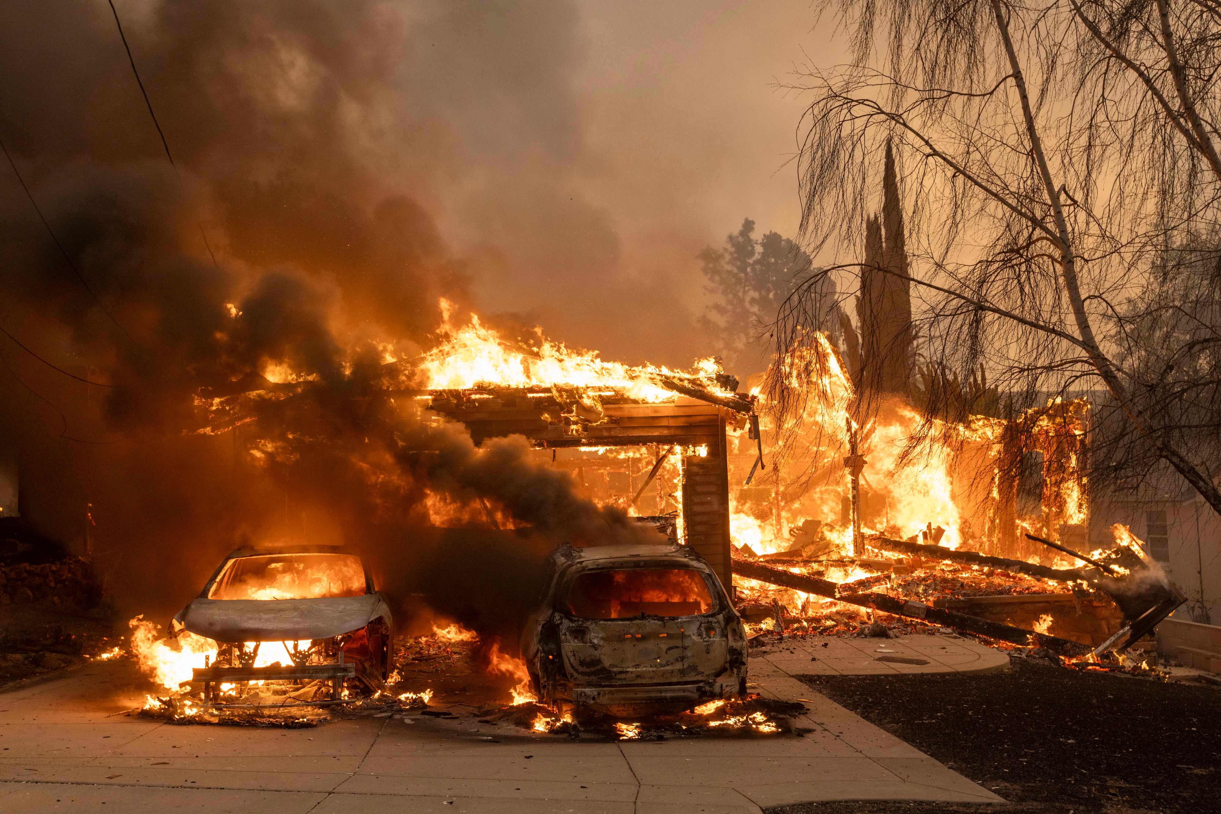 Images: Wildfires race across Southern California