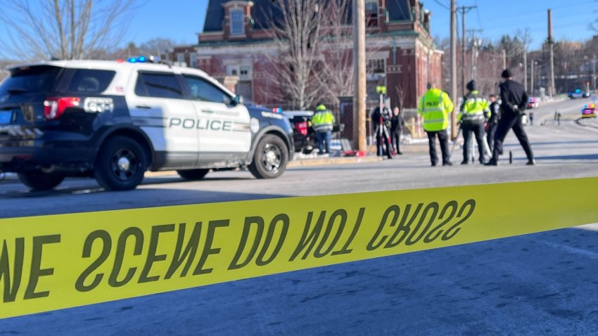 Police investigate after two pedestrians were hit by a car on Hamlet Avenue in Woonsocket, Rhode Island Monday.