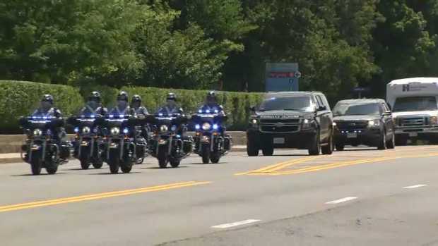 [NECN]  WATCH: Procession for Slain Weymouth Officer 